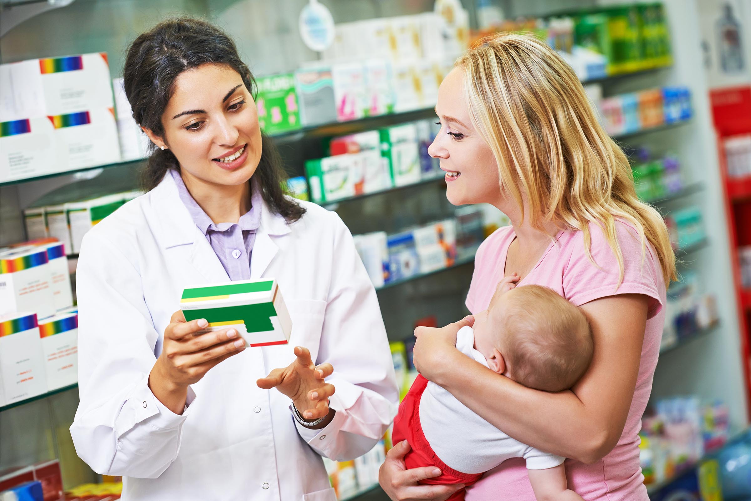 Pharmacy chemist, mother and child in drugstore