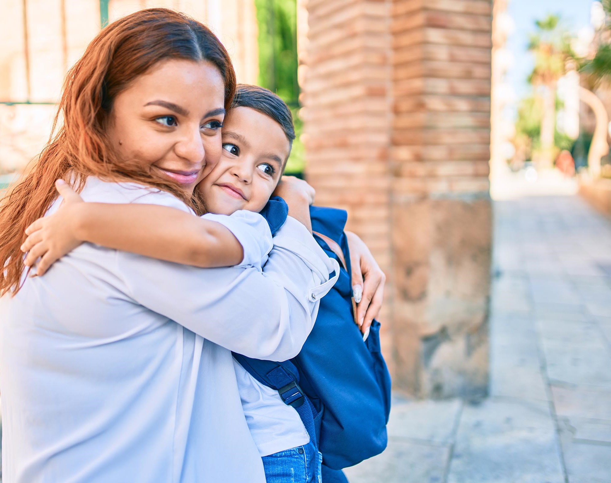 young mother hugging her son
