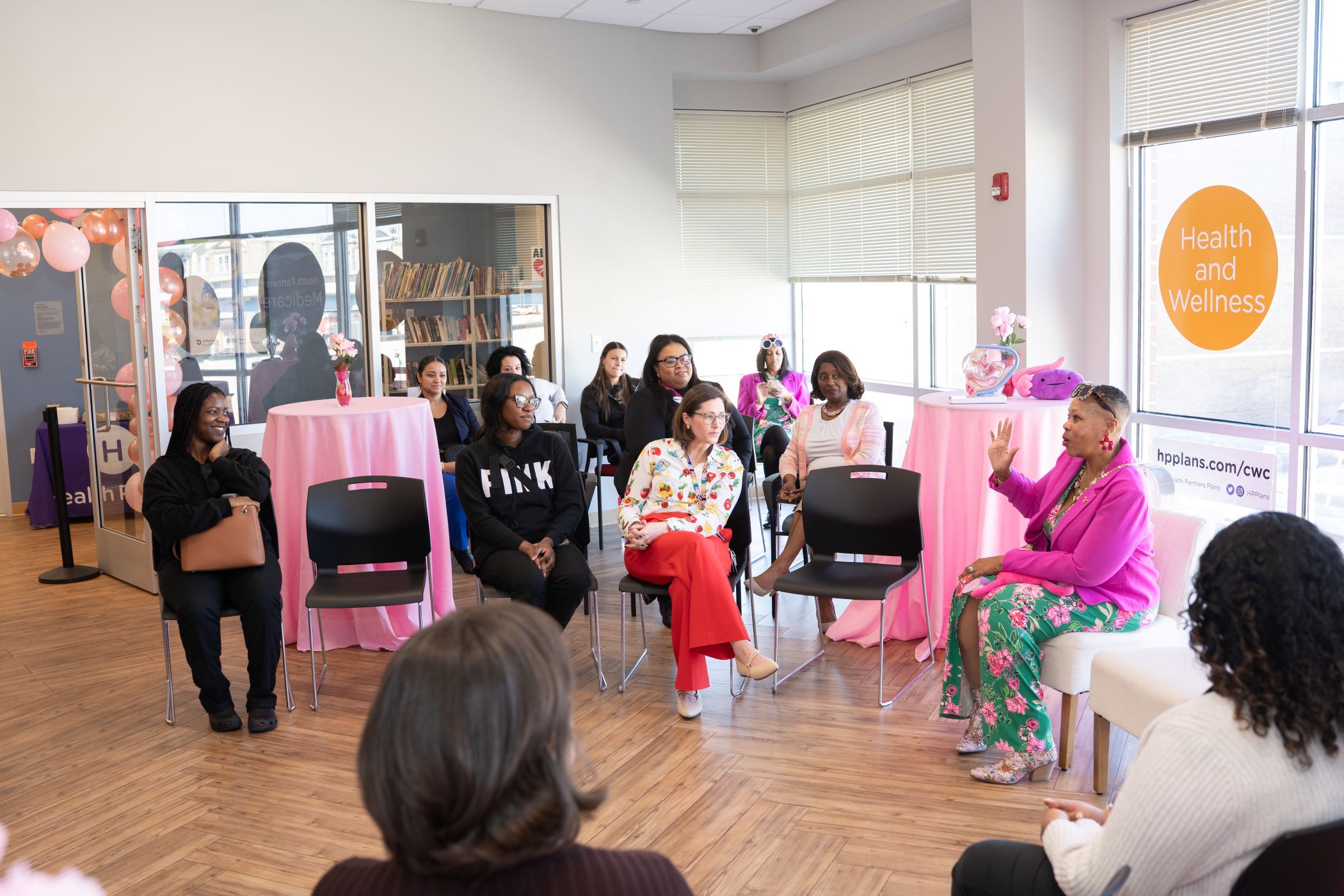 women gathered to hear a presentation about the period pantry