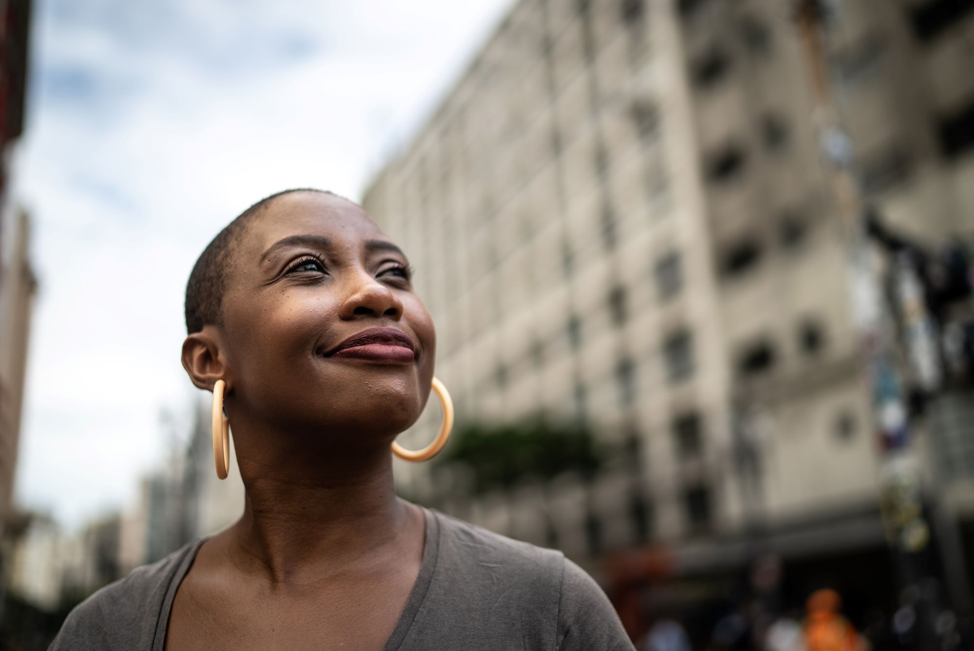 confident woman looks off into the distance